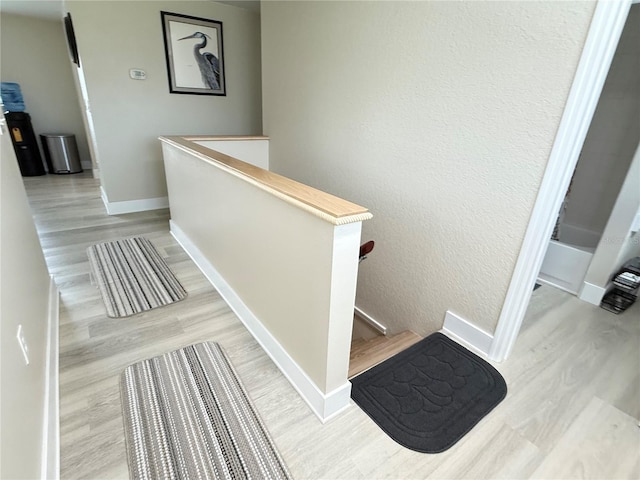 592 Ken Hubbard Rd, Terra Ceia, FL 34250 - staircase with wood finished floors and baseboards