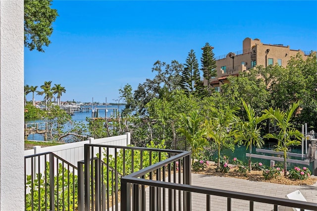 balcony featuring a water view