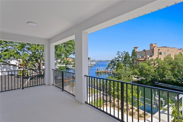 balcony featuring a water view