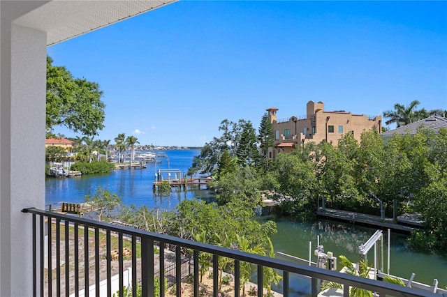 balcony featuring a water view