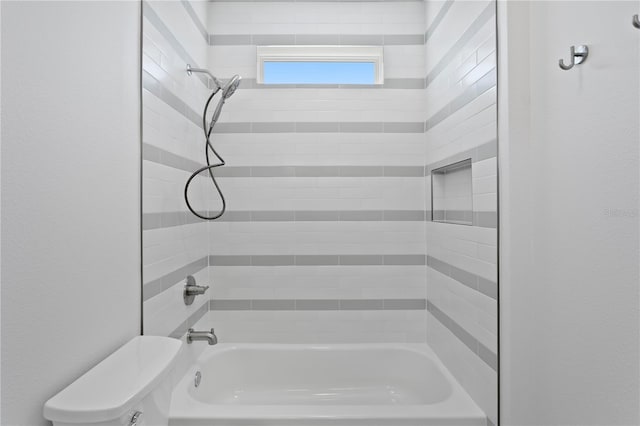 bathroom featuring toilet and shower / bath combination