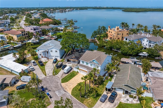 aerial view with a residential view and a water view