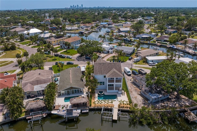 bird's eye view with a residential view and a water view