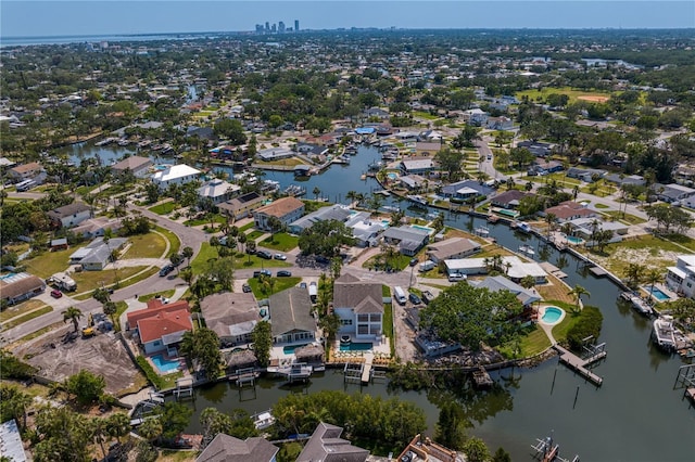 bird's eye view with a residential view and a water view