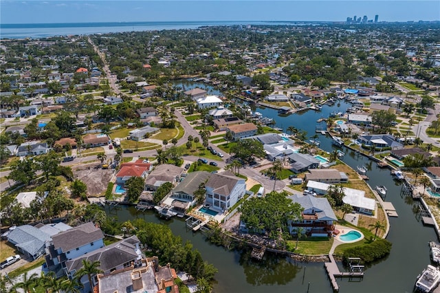 bird's eye view featuring a residential view and a water view