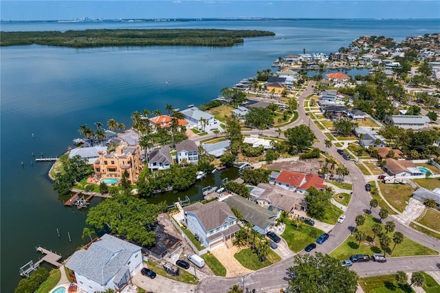 birds eye view of property featuring a water view and a residential view