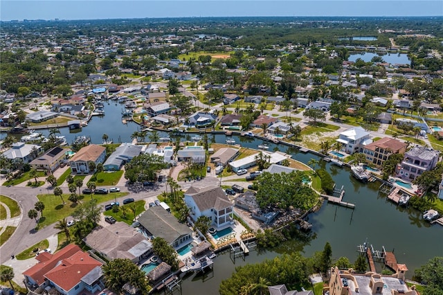 bird's eye view with a residential view and a water view