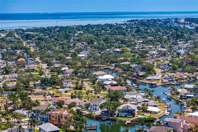 bird's eye view with a residential view and a water view