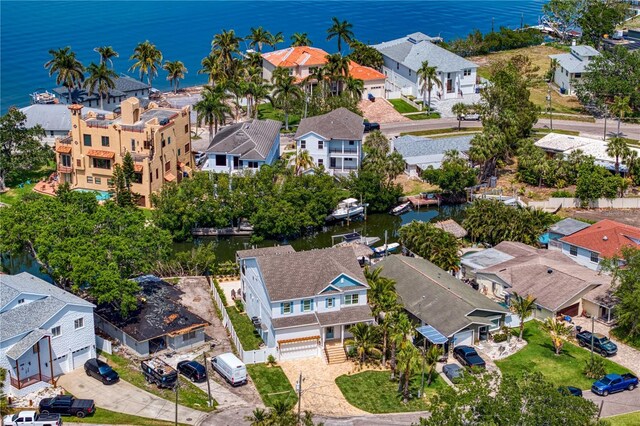 aerial view featuring a water view and a residential view