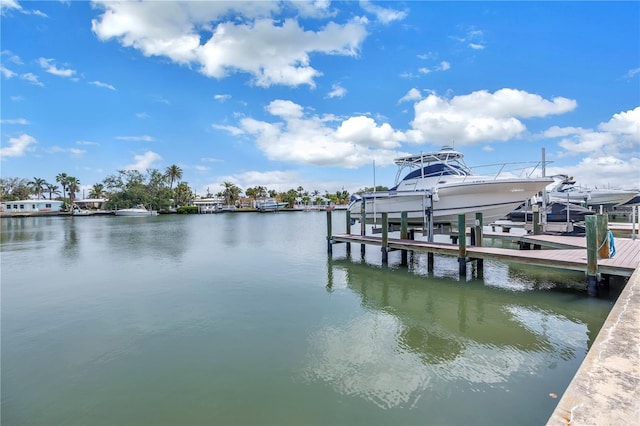 100 Windrush Blvd Unit 1, Indian Rocks Beach, FL 33785 - dock with boat lift and a water view