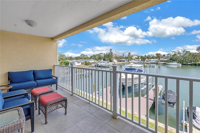 100 Windrush Blvd Unit 1, Indian Rocks Beach, FL 33785 - balcony featuring a water view and an outdoor living space