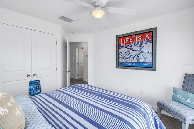 100 Windrush Blvd Unit 1, Indian Rocks Beach, FL 33785 - bedroom with carpet floors, a closet, a ceiling fan, and baseboards
