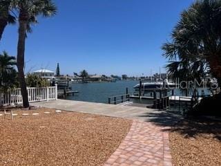 510 64th Ave, St Pete Beach, FL 33706 - dock featuring a water view and boat lift