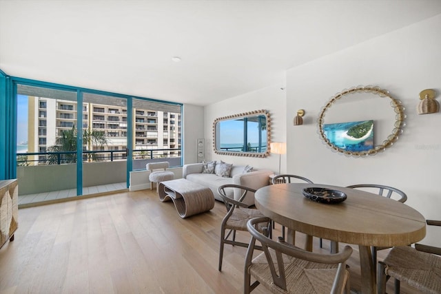 interior space with baseboards and wood finished floors