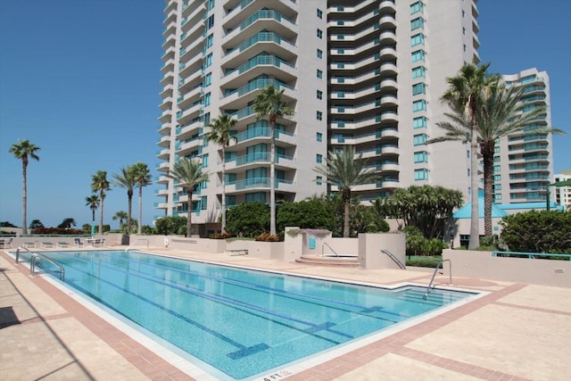 pool with a patio area