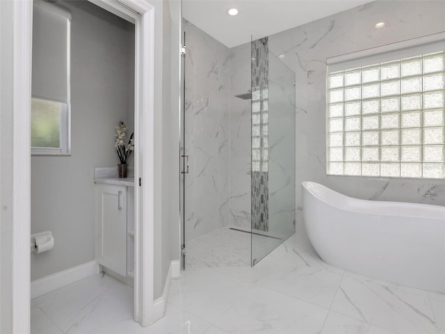 full bath featuring a marble finish shower, recessed lighting, marble finish floor, and a soaking tub