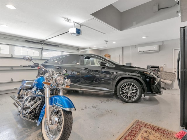garage with recessed lighting, a wall unit AC, freestanding refrigerator, and a garage door opener