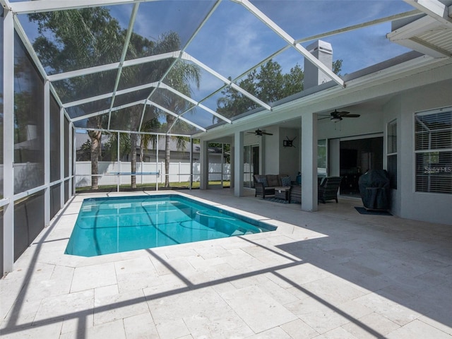view of pool with a patio area, a fenced in pool, a ceiling fan, an outdoor hangout area, and fence