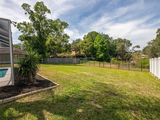 view of yard featuring a fenced backyard
