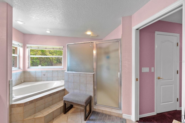 4022 Valrico Grove Dr, Valrico, FL 33594 - full bathroom with a shower stall, a textured ceiling, a bath, and recessed lighting