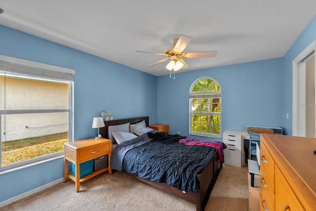 4022 Valrico Grove Dr, Valrico, FL 33594 - bedroom with light carpet, a ceiling fan, and baseboards