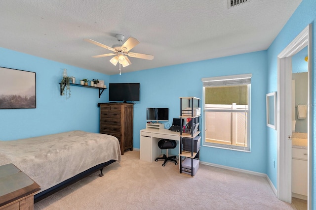 4022 Valrico Grove Dr, Valrico, FL 33594 - bedroom with light carpet, an office area, a textured ceiling, baseboards, and a ceiling fan