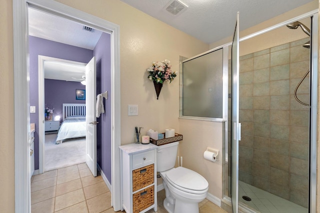 4022 Valrico Grove Dr, Valrico, FL 33594 - bathroom with a shower stall, tile patterned floors, a ceiling fan, and ensuite bathroom