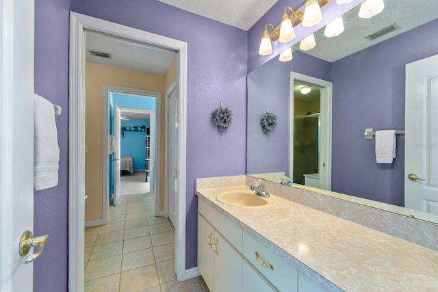 4022 Valrico Grove Dr, Valrico, FL 33594 - full bath featuring tile patterned floors, baseboards, an enclosed shower, and vanity