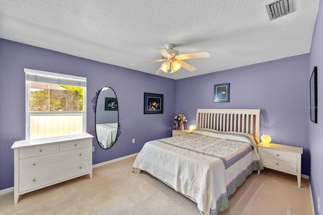 4022 Valrico Grove Dr, Valrico, FL 33594 - carpeted bedroom with baseboards, a textured ceiling, and a ceiling fan