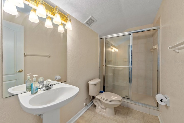 4022 Valrico Grove Dr, Valrico, FL 33594 - bathroom featuring tile patterned floors, baseboards, a shower stall, toilet, and a sink