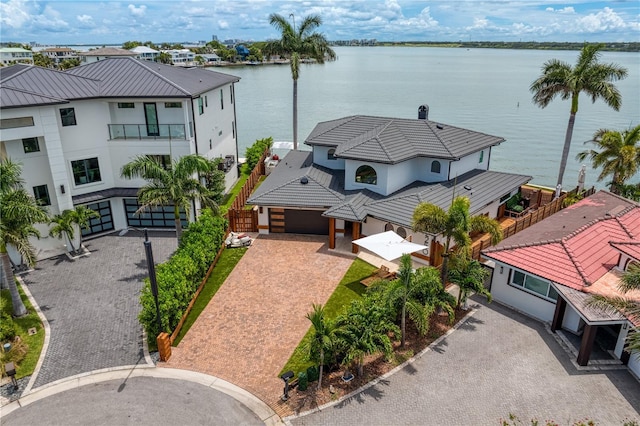 drone / aerial view with a water view