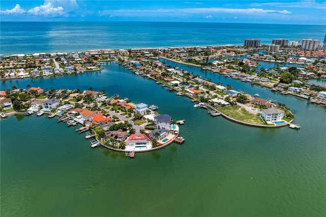 bird's eye view featuring a residential view and a water view
