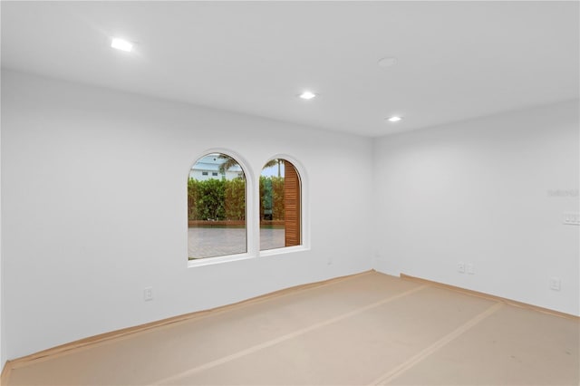 spare room with recessed lighting