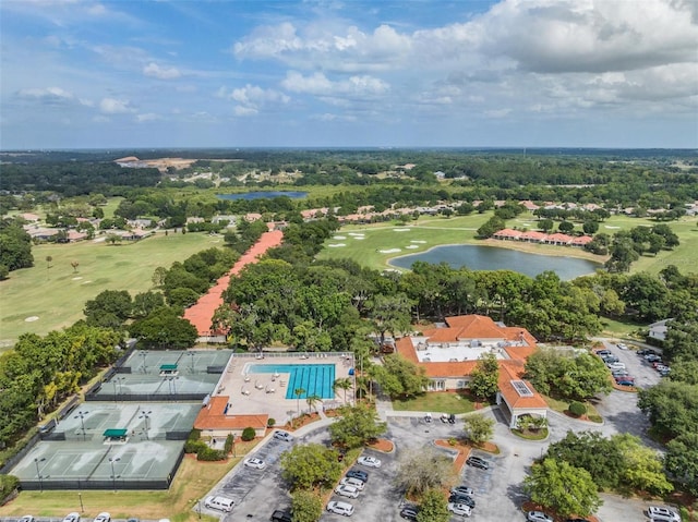 drone / aerial view featuring a water view and view of golf course