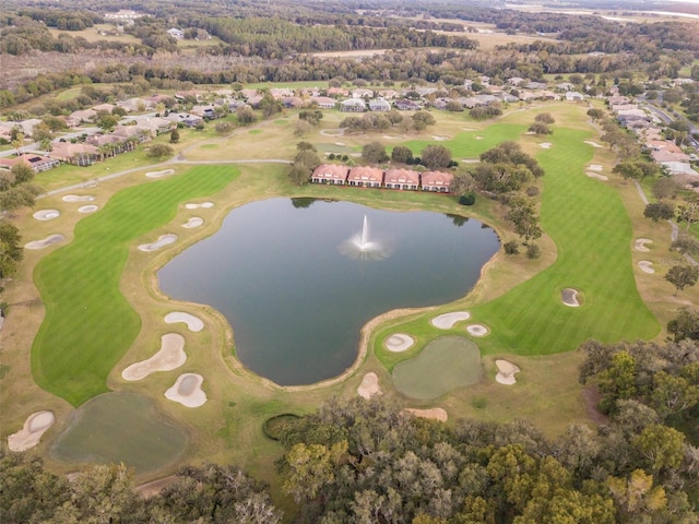 bird's eye view featuring golf course view, a residential view, and a water view