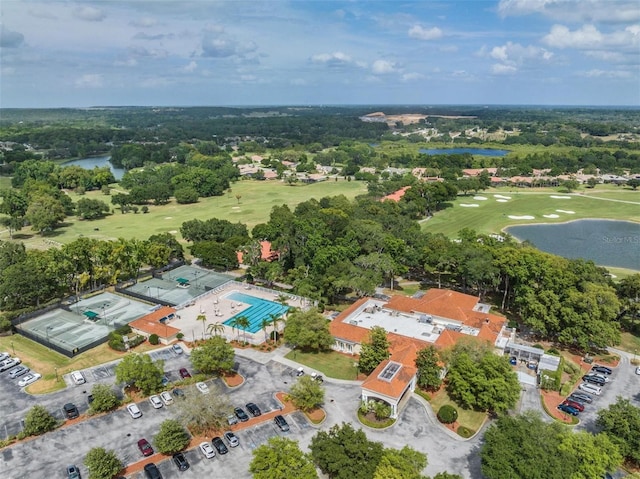 bird's eye view featuring a water view and golf course view