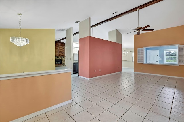unfurnished living room featuring visible vents, high vaulted ceiling, light tile patterned floors, and ceiling fan with notable chandelier