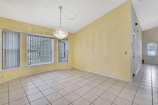 unfurnished dining area with light tile patterned floors, a chandelier, vaulted ceiling, and baseboards