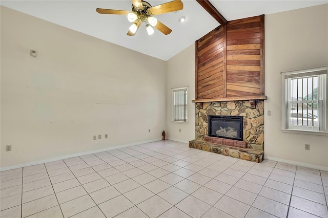 unfurnished living room featuring light tile patterned floors, beamed ceiling, ceiling fan, and a fireplace
