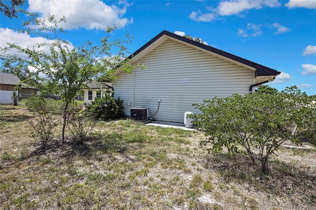 view of home's exterior with central air condition unit
