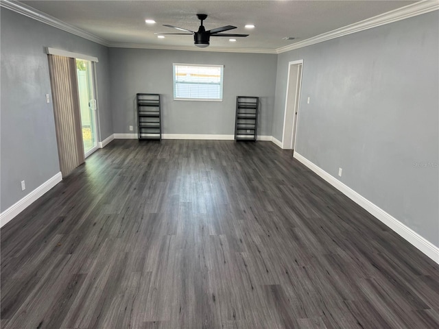 empty room with crown molding, baseboards, ceiling fan, dark wood-type flooring, and recessed lighting