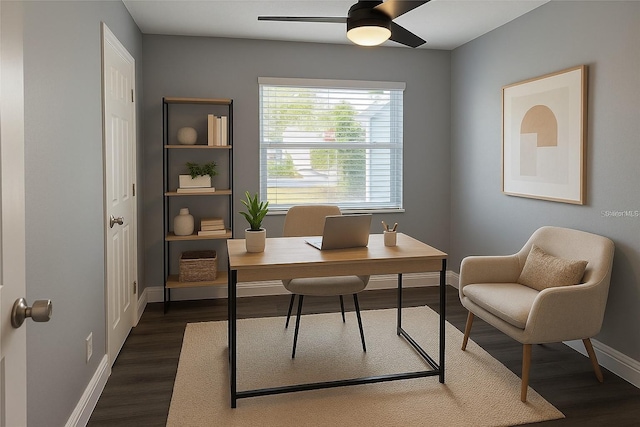 office space featuring ceiling fan, baseboards, and wood finished floors