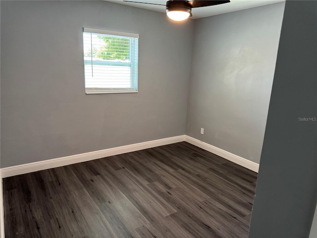 2205 N Grady Ave, Tampa, FL 33607 - empty room featuring baseboards, a ceiling fan, and dark wood-type flooring