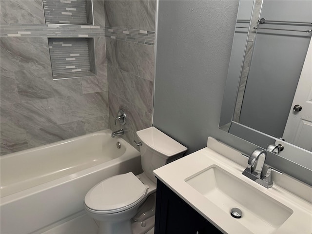 2205 N Grady Ave, Tampa, FL 33607 - bathroom featuring vanity, a textured wall, shower / bathtub combination, and toilet