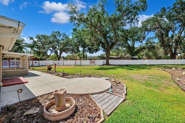505 S Larry Cir, Brandon, FL 33511 - view of yard featuring a patio