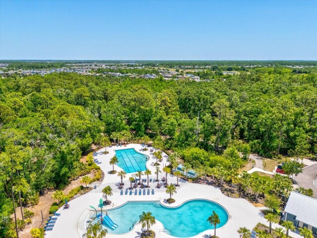 aerial view featuring a view of trees