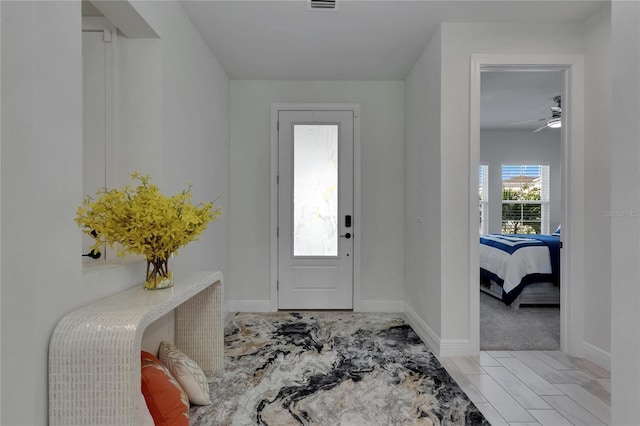 6252 Hidden Branch Dr, Apollo Beach, FL 33572 - entryway with visible vents and baseboards