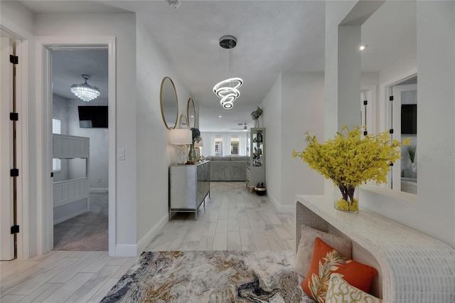 6252 Hidden Branch Dr, Apollo Beach, FL 33572 - corridor featuring wood finish floors and baseboards