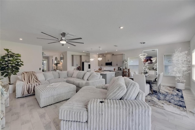 6252 Hidden Branch Dr, Apollo Beach, FL 33572 - living area featuring recessed lighting, a ceiling fan, baseboards, and light wood-type flooring