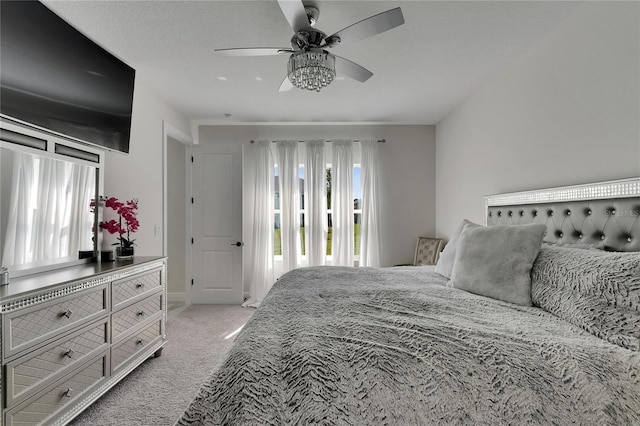 6252 Hidden Branch Dr, Apollo Beach, FL 33572 - bedroom with baseboards, ceiling fan, light carpet, and access to exterior